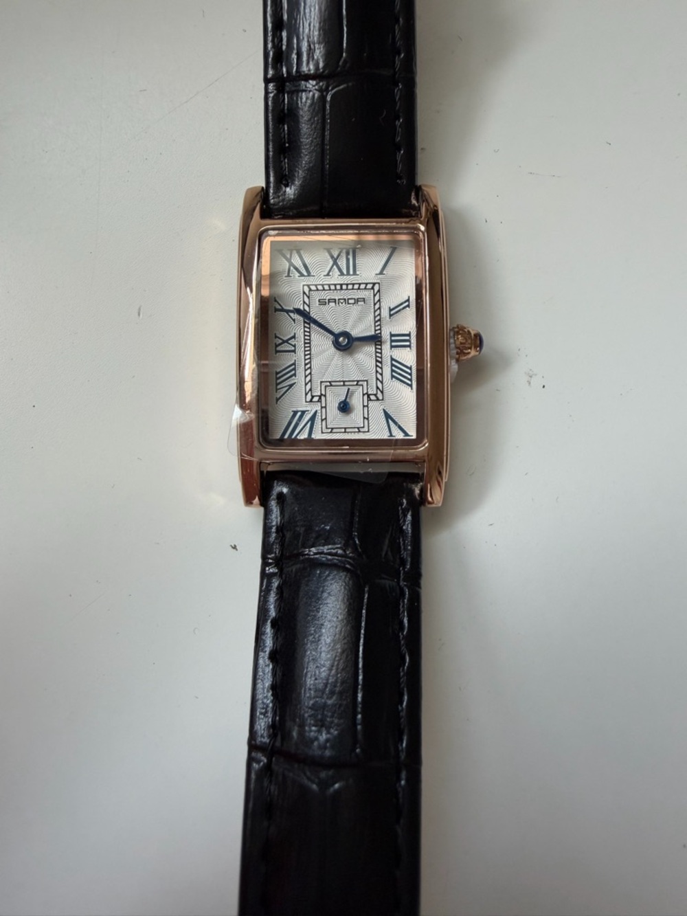 Women’s tank watch rose gold black leather strap